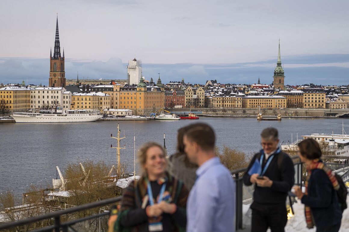 ESCAIDE participants on balcony at Munchenbryggeriet